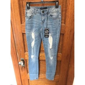Medium Wash Distressed Skinny Jeans